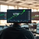 VTWO ETF stock graph showing significant inflow surge on financial trading monitors.