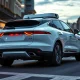 A Waymo autonomous vehicle drives on a city street as robotaxi ridership reaches 500,000 weekly trips.