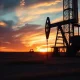 Oil drilling rig at dusk, representing Weatherford International's core business operations.