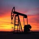 WTI crude oil supply shock analysis showing oil drilling rig operations during market volatility