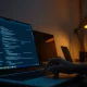 A developer's workspace showing code and an AI assistant interface, representing Anthropic's new Claude Code pricing.