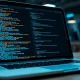 A laptop screen showing lines of code, representing the Anthropic source code leak.