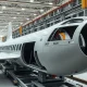General Dynamics aerospace manufacturing facility with assembly line.