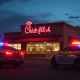 Police vehicles outside a Chick-fil-A restaurant in New Jersey following a reported shooting.
