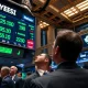 Traders on NYSE floor watching S&P 500 and Nasdaq hit record highs on April 26, 2026