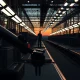Tesla factory floor with robotic arm, representing the company's increased capital expenditure.
