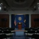 The White House briefing room podium ahead of a presidential address on the Iran conflict.