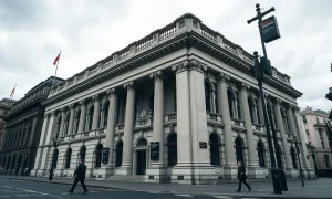 Bank of England building in London under cloudy sky, symbolizing UK bank tax debate