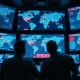 Military analysts monitoring a digital supply chain risk map with AI-detected threats linked to China