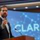 Ripple CEO Brad Garlinghouse speaking at a press conference about the CLARITY Act