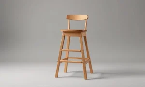 A wooden children's tower stool isolated on a neutral background, subject of a nationwide recall.