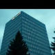 Microsoft corporate headquarters in Redmond, Washington, shown under overcast skies, representing the company's central role in the AI industry.