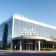 Cisco headquarters building in San Jose, California, on a clear day.