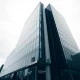 Commerzbank headquarters in Frankfurt, Germany, under overcast sky, symbolizing corporate defense strategy.