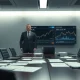 Federal agent standing over financial documents and trading charts in an investigation room