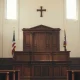 California courtroom interior with empty jury boxes and judge's bench