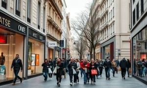 Shoppers on a retail street in a Eurozone city with storefronts and subdued foot traffic