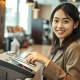 Woman using smartphone for contactless payment at a Seoul coffee shop, representing the rise of face recognition payments in South Korea.