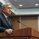 Federal Reserve Bank of Richmond President Thomas Barkin speaking at a podium