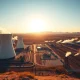 Fervo Energy geothermal power plant facility at sunrise in Utah desert