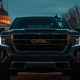 General Motors vehicle in urban setting with digital data overlay representing connected car privacy concerns