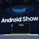 Google Android Show stage with Googlebook laptop and Gemini AI interface