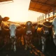 Herd of cattle in a feedlot during late afternoon, representing live cattle futures market activity.