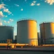 Natural gas storage tanks at an industrial facility at dusk