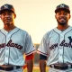 Shohei Ohtani and Francisco Lindor in New Balance uniforms, representing the brand's family-oriented baseball marketing strategy