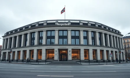 Exterior of Norges Bank headquarters in Oslo, Norway, on a cloudy day.