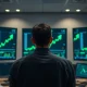 Forex trading desk with NZD/USD charts showing price approaching 0.6000 amid improved risk sentiment