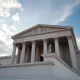 Exterior view of the United States Supreme Court building on a partly cloudy day