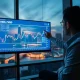 Financial analyst reviewing USD/SGD chart in Singapore office with skyline view