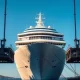Large cruise ship at a port with Cuban flag in background, representing legal ruling on seized property
