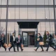 Truecaller office building in Stockholm with employees leaving after layoffs announcement
