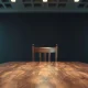 Empty chair at a negotiating table with American and Iranian flags, symbolizing stalled ceasefire talks.