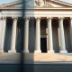 Federal Reserve building in Washington D.C. on a clear day, representing US monetary policy and inflation concerns.