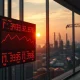 Stock market board showing red numbers with oil refinery in background symbolizing geopolitical market pressure