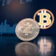 Zcash coin on a dark surface with a blurred Bitcoin symbol in the background