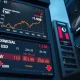 Currency exchange board in an Asian financial district showing KRW and IDR weakening against the USD.
