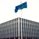European Commission headquarters in Brussels on a cloudy day