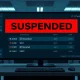 Cryptocurrency exchange interface showing suspended trading for WLFI and USD1 tokens.