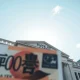 Bank of Japan headquarters in Tokyo with Japanese yen banknote in foreground