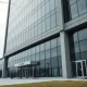 Exterior of NAIC headquarters building under overcast sky, representing regulatory disruption after a cyber attack.