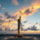 SpaceX Falcon 9 rocket on launch pad at Cape Canaveral at dusk