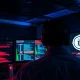 Security analyst monitoring blockchain attack alerts in a dimly lit operations center