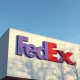 Exterior of a FedEx facility with company logo, representing the EEOC lawsuit over disability discrimination.