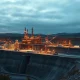 Industrial critical minerals processing plant at dusk, representing mining sector facing short selling pressure
