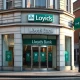 Exterior of a Lloyds Bank branch in a UK city center during late afternoon