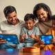 Family using tablet and smartphone with glowing AI interface in living room